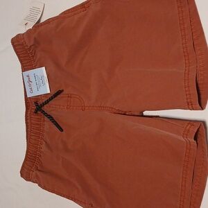 Cat & Jack Terracotta pull on short shorts above the knee.
